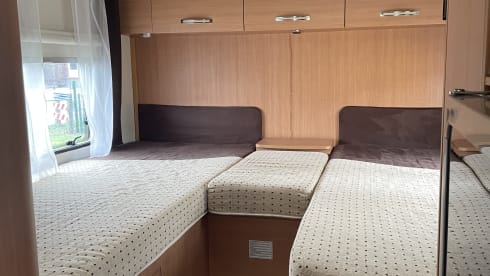 Semi-Integrated Camper for 4 people.