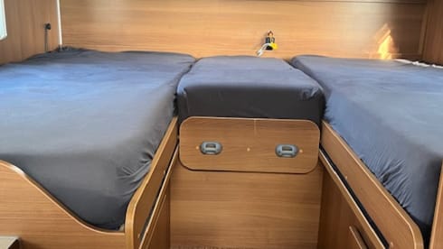2p Carado semi-integrated from 2013 with single beds. 