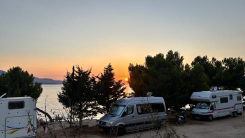 5 to 6 person self-build bus camper Mercedes Sprinter automatic.