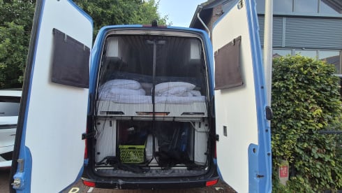 De brilsmurf – 2p Volkswagen bus from 2016/2023