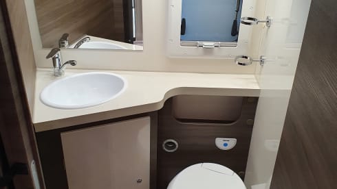 8 – luxury 4 person mclouis Carat 2022 with fixed bed in the back
