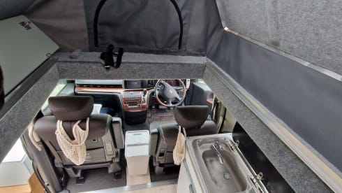 El – 2/3 berth Nissan Elgrand campervan with pop up roof