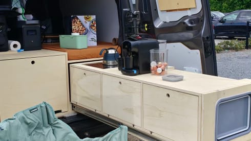 The AdventuresVan β Off-grid custom-made campervan with roof tent