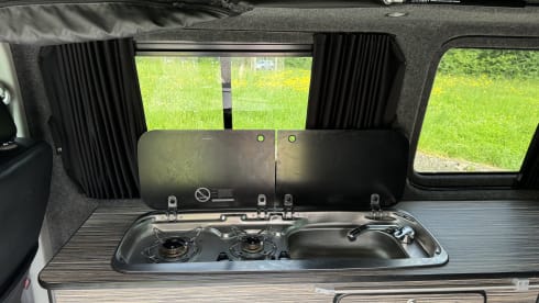 Quicksilver – Rent our Head Turning Quicksilver - LWB T5 with Pop Top roof