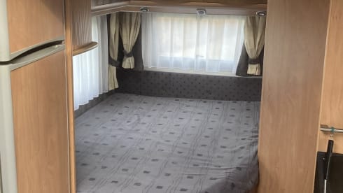 Bürstner Family Camper 4 persons, with bicycle carrier.