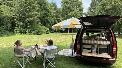 Super nice Volkswagen Caddy Maxi campervan from 2011 with tent, 4p