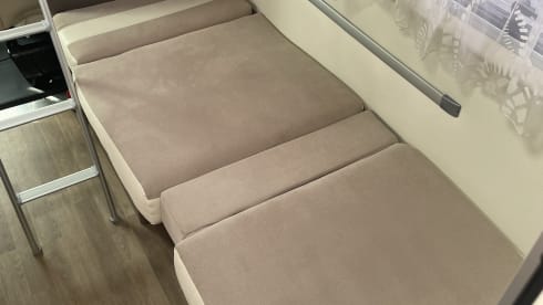 Spacious 7-person Rimor alcove family camper from 2019
