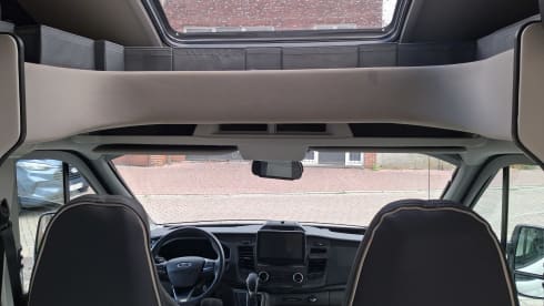 Luxury 4p Ford Kronos Roller Team 2021 for rent – Travel in comfort!