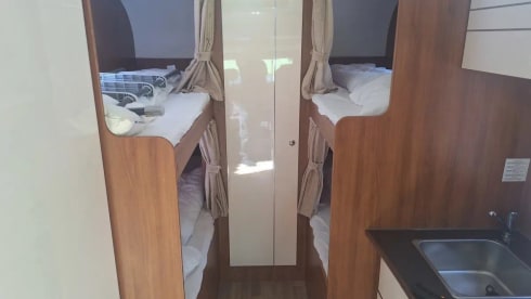 Cool family cabin, 6-person Rimor alcove with a fixed bed for everyone.