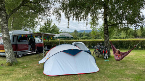 Original retro Volkswagen T3 Dehler with complete camping equipment.
