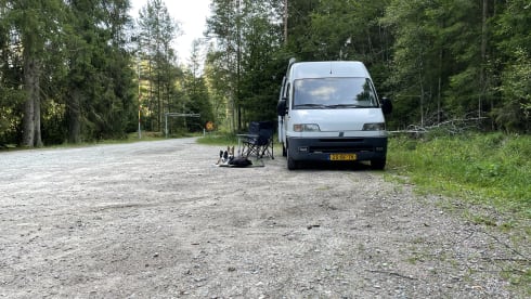 On an adventure with a reliable bus camper.