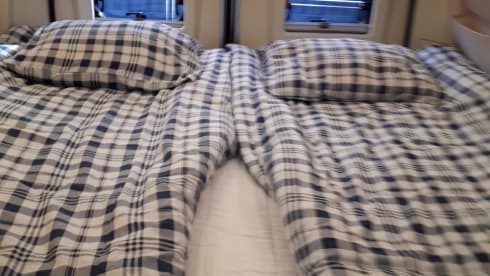 Bus camper with 2 length beds. Automatic 150 hp.