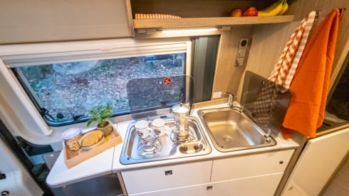 Fijnja – Luxury 4 pers. Pössl bus camper with sleeping lifting roof from 2019