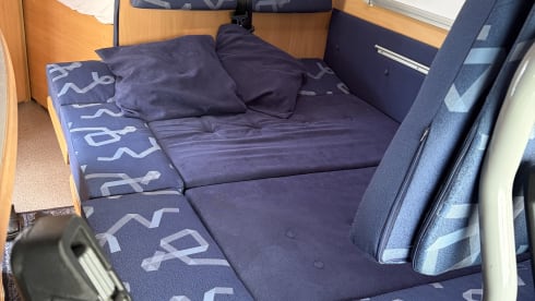 Neat, reliable, and compact 4-seater semi-integrated motorhome from 2002