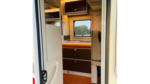 Koosje – Luxury Camper (5 persons) Lengthwise and lifting bed L-seat