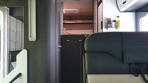 Luxury mobile home with spacious beds and a very large garage