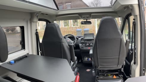 Fiat Adria 640 bus camper with large garage and fold-down bed 