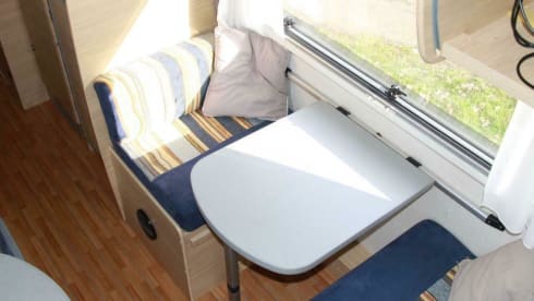 Spacious furnished family camper with bunk beds and air conditioning