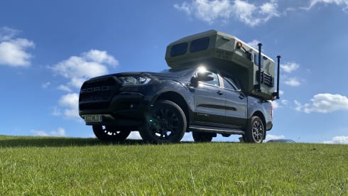 Edinburgh Airport - tardis camper on a pick up truck