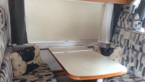 Dinghy  – Very neat and cozy camper for 2 people with sufficient storage space.