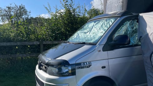 Quicksilver – Rent our Head Turning Quicksilver - LWB T5 with Pop Top roof