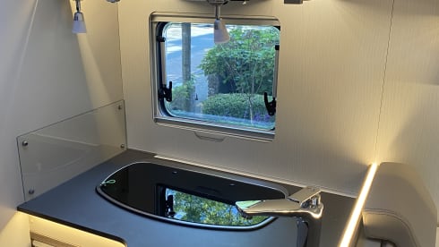 Luxurious, modern 4-person Bürstner with queen bed, pull-down bed and bicycle rack