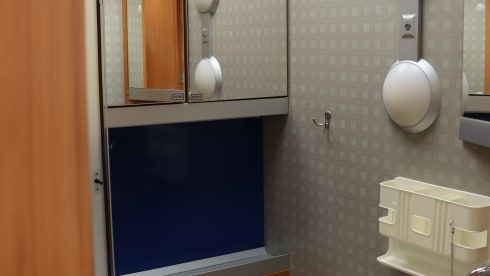 Camper with top layout