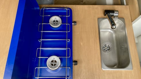 Cosy, compact off-grid Ford camper van