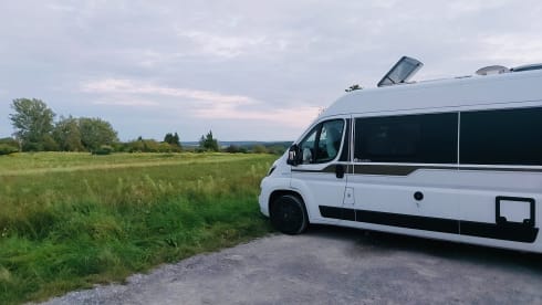 Experience the freedom of a compact bus camper