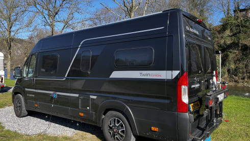 Fiat Adria 640 bus camper with large garage and fold-down bed 