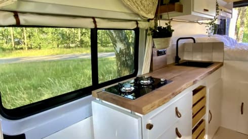 Luxurious off-grid bus from 2021 with a super atmospheric interior 