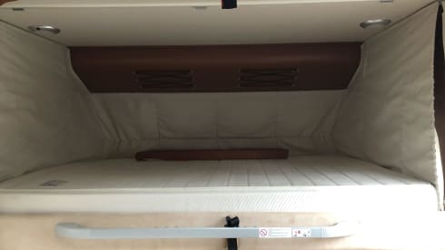 Wonderful luxury 4-person integral camper with plenty of storage space & bicycle carrier.