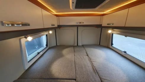 Stijn – Luxury Pössle Bus Camper from 2021 - Including 2 electric bicycles & air conditioning 