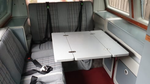 Original retro Volkswagen T3 Dehler with complete camping equipment.