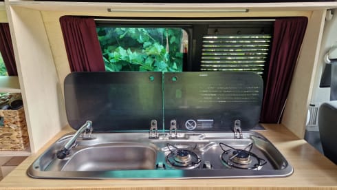 Self-built VW T5 camper for 2 people