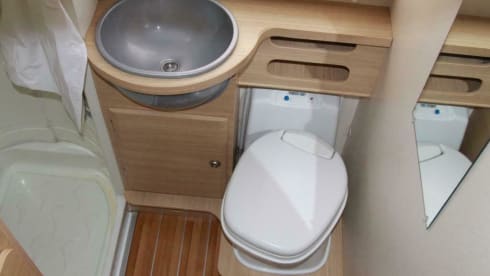 Spacious furnished family camper with bunk beds and air conditioning