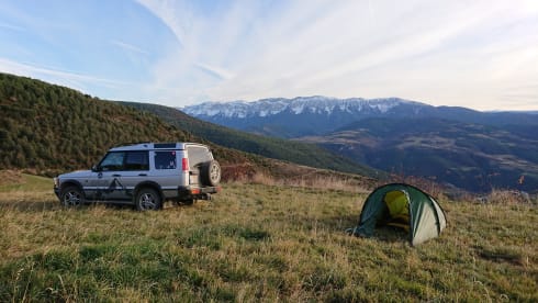 Disco II – Land Rover Discovery met rooftop tent uit 2002