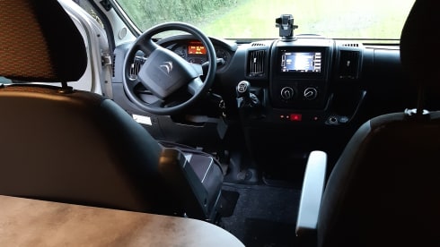 Nice Pössl camper van with comfortable bed