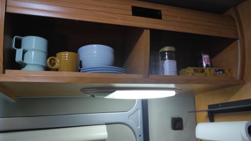 Cosy and compact 2p Ford Pösll campervan.