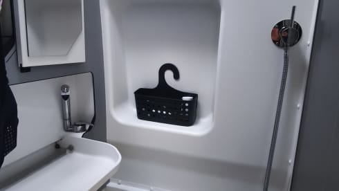 Off-grid campervan with lift-up bed, large garage 2024