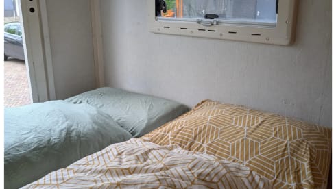  Old postal wagon transformed into a self-sufficient 4-person camper