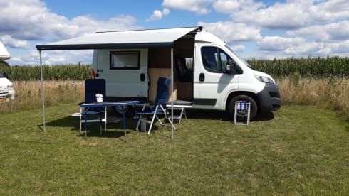 Nice Pössl camper van with comfortable bed