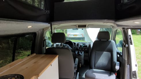 4-person Volkswagen with pop-up roof and long wheelbase for extra space