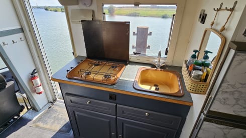 Comfortable 4-person Ford Transit Rimor Camper - Perfect for Families!