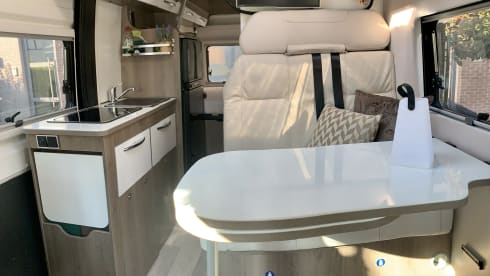 Experience the freedom of a compact bus camper