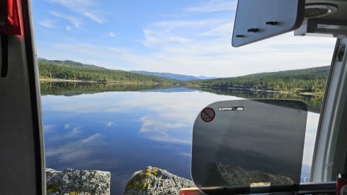 On an adventure with a reliable bus camper.