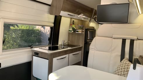 Experience the freedom of a compact bus camper
