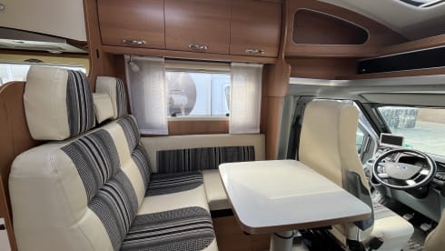 4p LMC semi-integrated with awning, air conditioning and cruise control.