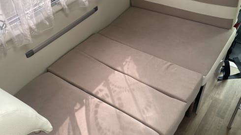 Spacious 7-person Rimor alcove family camper from 2019