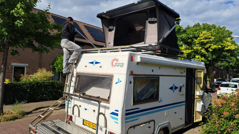 With Mobility Scooter/Scooter carrier and Pop-Up roof tent!